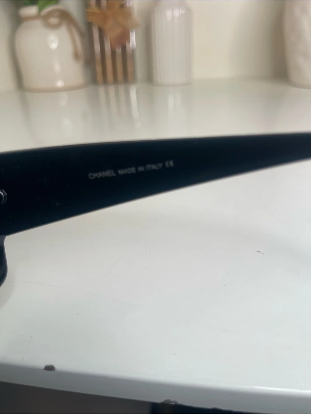 CHANEL Black Sunglasses with Gold Accent